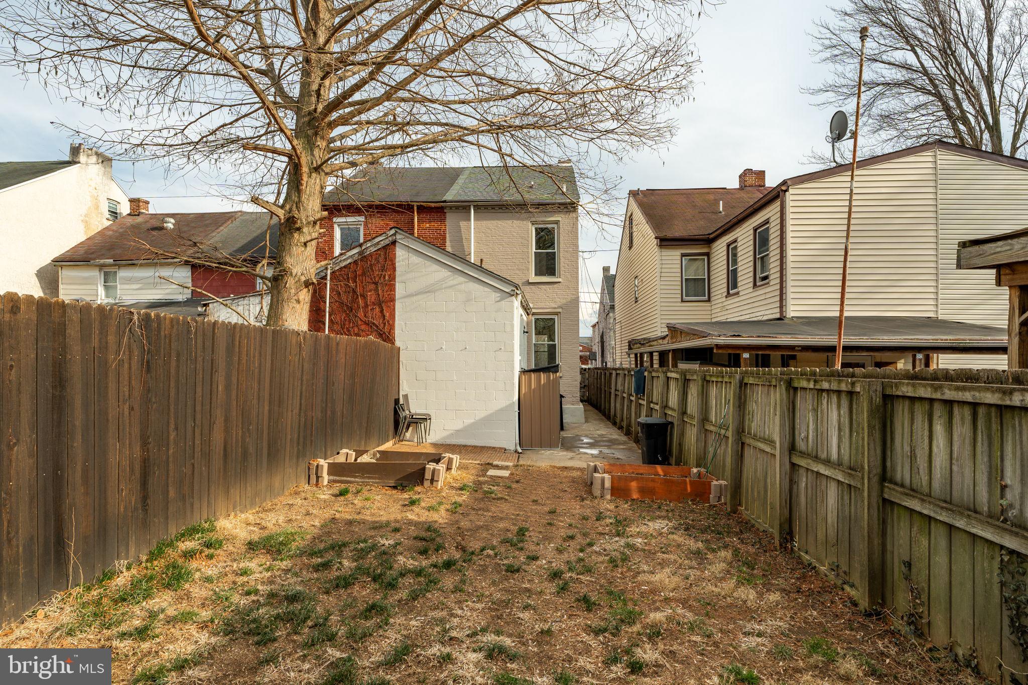 471 High Street Lancaster, PA 17603 - Photo 21 of 22 a view of a house with wooden fence