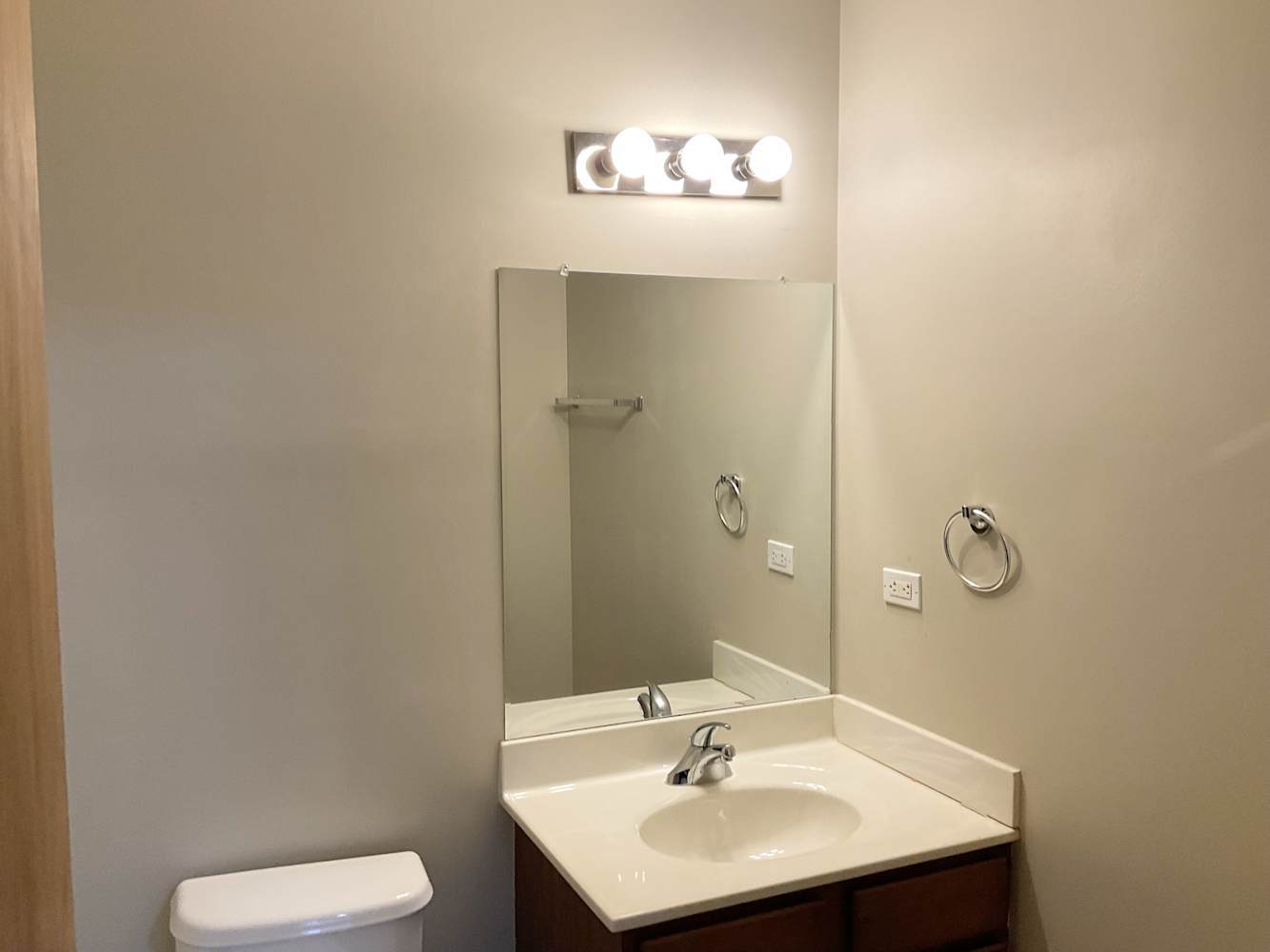 15515 Long Avenue Oak Forest, IL 60452 - Photo 9 of 10 a bathroom with a sink a toilet and mirror