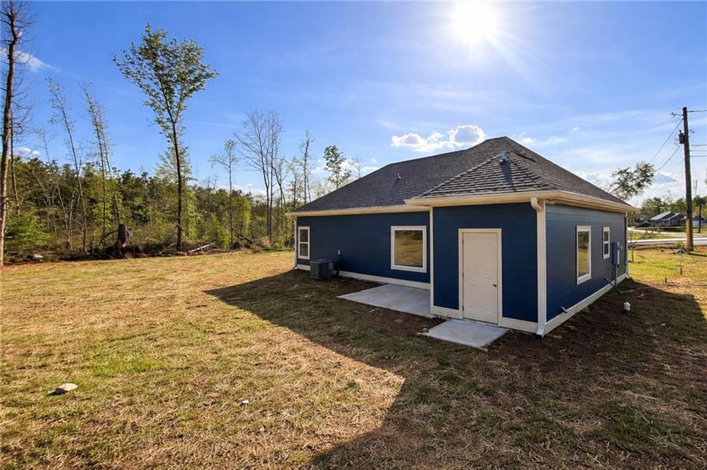 23 S Road Griffin, GA 30224 - Photo 31 of 32 a front view of a house with a yard