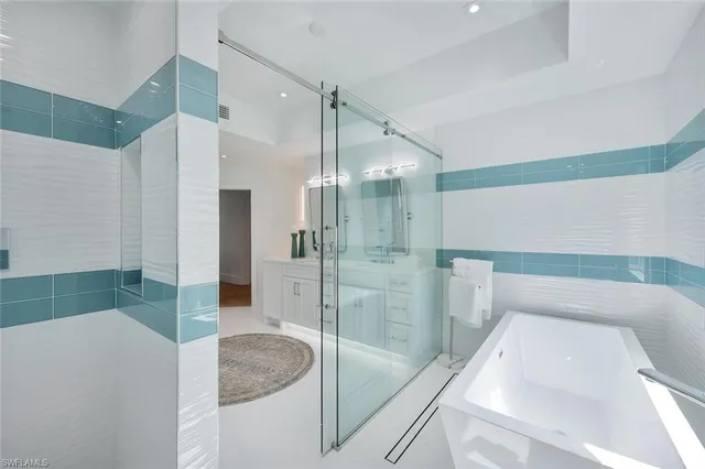 a bathroom with a sink and a shower