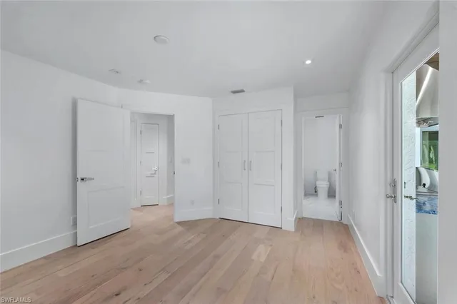 a view of a livingroom with wooden floor