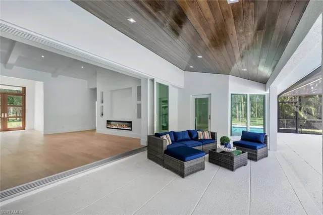 a view of swimming pool with a patio