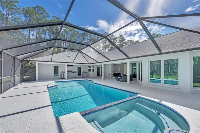 a view of swimming pool with yard