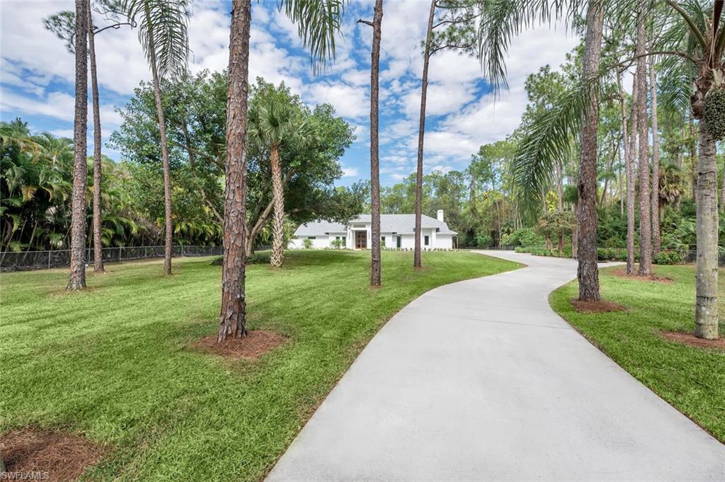 5253 Sycamore Drive Naples, FL 34119 - Photo 46 of 49 a view of a park with palm trees
