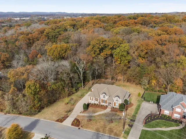 a view of a kitchen with granite countertop a sink