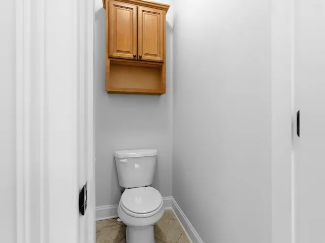 a kitchen with a table and chairs