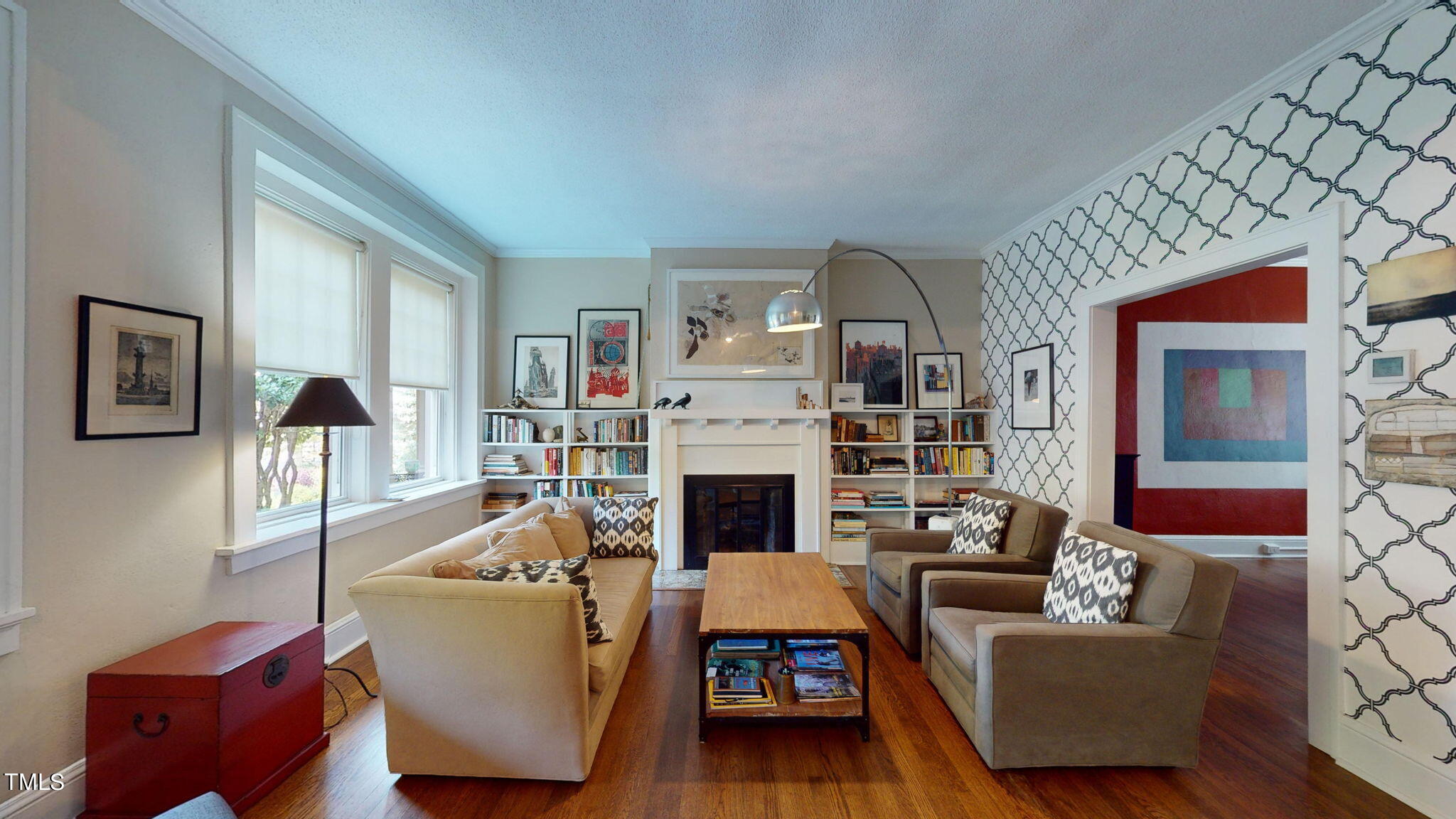 132 Woodburn Road Raleigh, NC 27605 - Photo 11 of 53 a living room with furniture and a fireplace