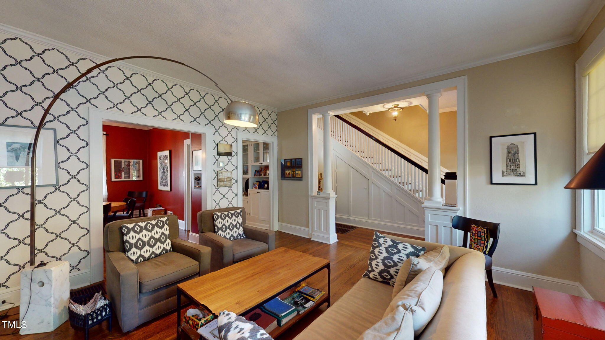 132 Woodburn Road Raleigh, NC 27605 - Photo 13 of 53 a living room with furniture and a large window