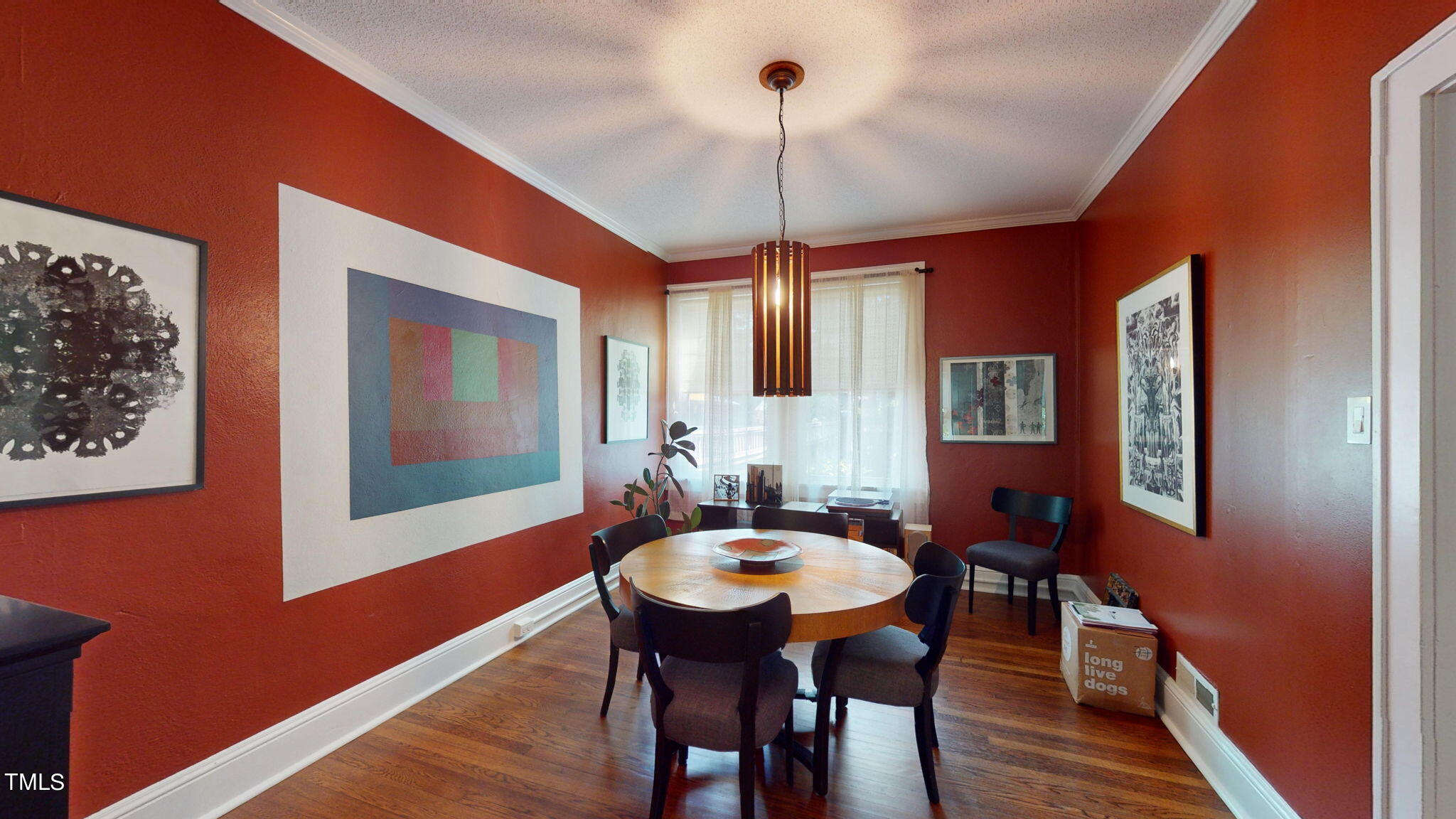 132 Woodburn Road Raleigh, NC 27605 - Photo 15 of 53 a dining room with furniture and window