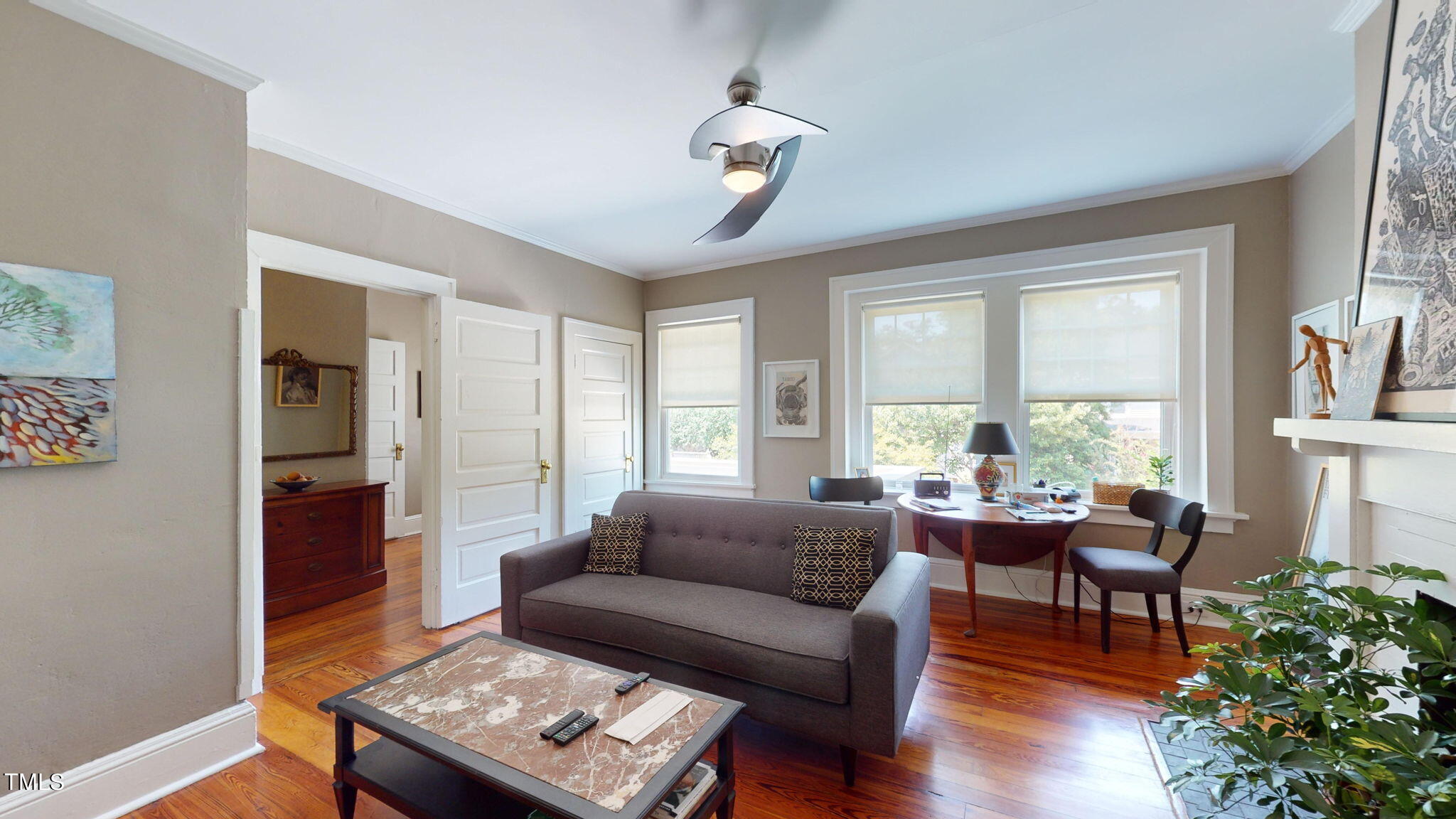 132 Woodburn Road Raleigh, NC 27605 - Photo 25 of 53 a living room with furniture and a window