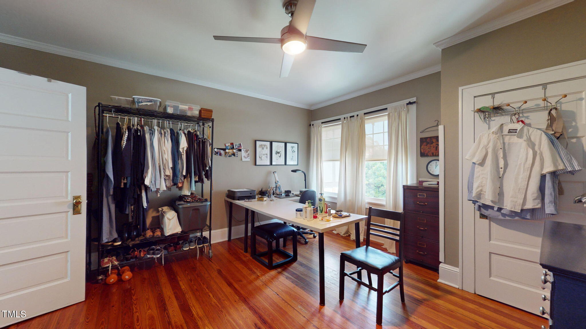 132 Woodburn Road Raleigh, NC 27605 - Photo 26 of 53 a view of a livingroom with furniture window and wooden floor