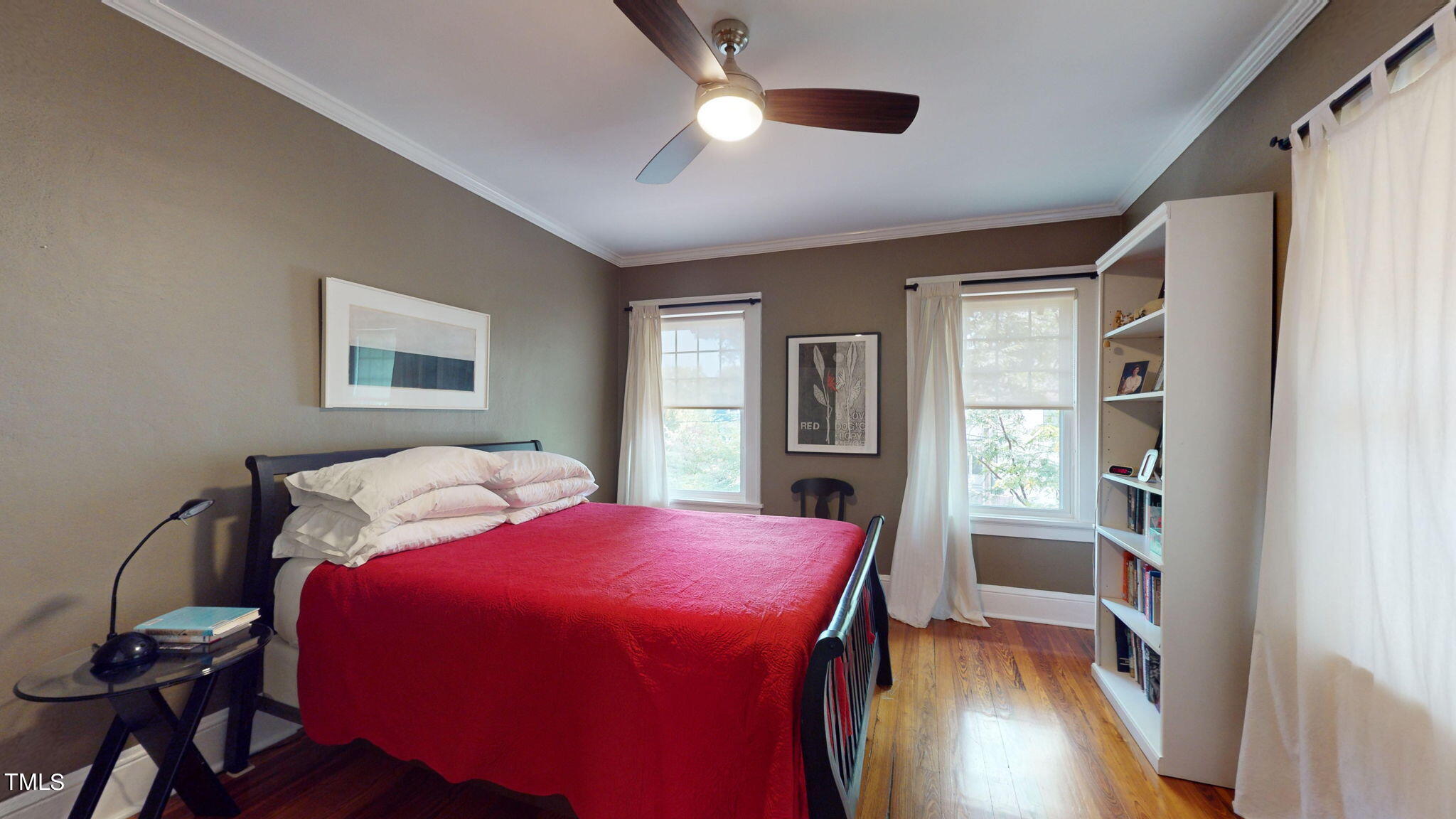 132 Woodburn Road Raleigh, NC 27605 - Photo 30 of 53 a bedroom with a bed and a window