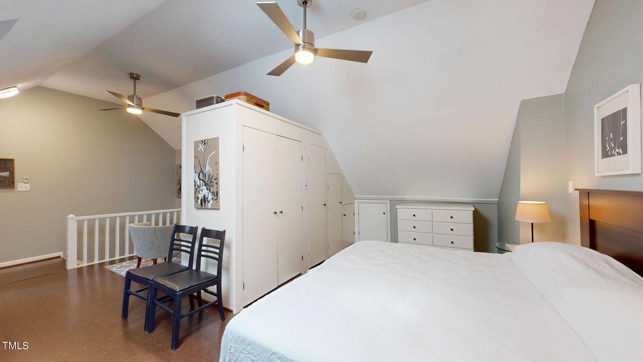 132 Woodburn Road Raleigh, NC 27605 - Photo 35 of 53 a bedroom with a bed and a table in it