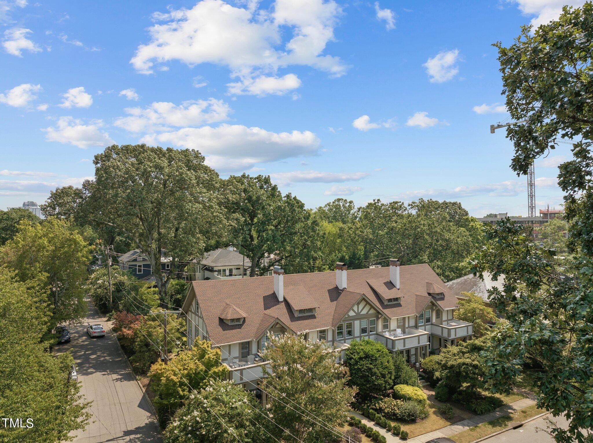 132 Woodburn Road Raleigh, NC 27605 - Photo 45 of 53 an aerial view of a house with lots of trees