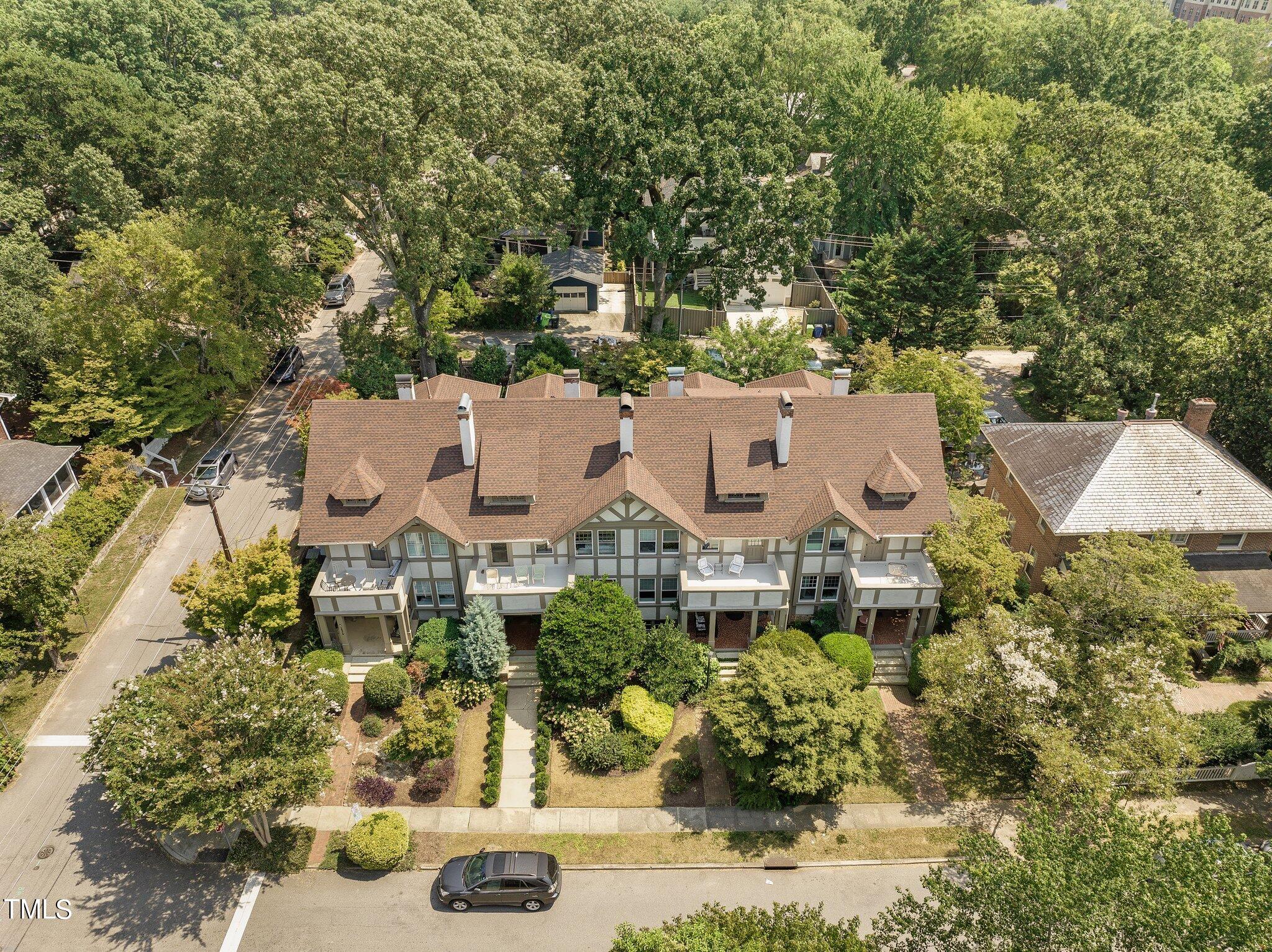 132 Woodburn Road Raleigh, NC 27605 - Photo 47 of 53 an aerial view of residential house with outdoor space and trees all around