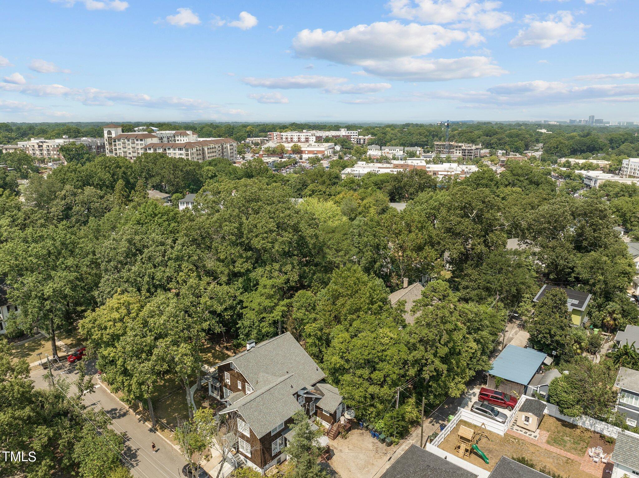 132 Woodburn Road Raleigh, NC 27605 - Photo 51 of 53 an aerial view of a house with a yard