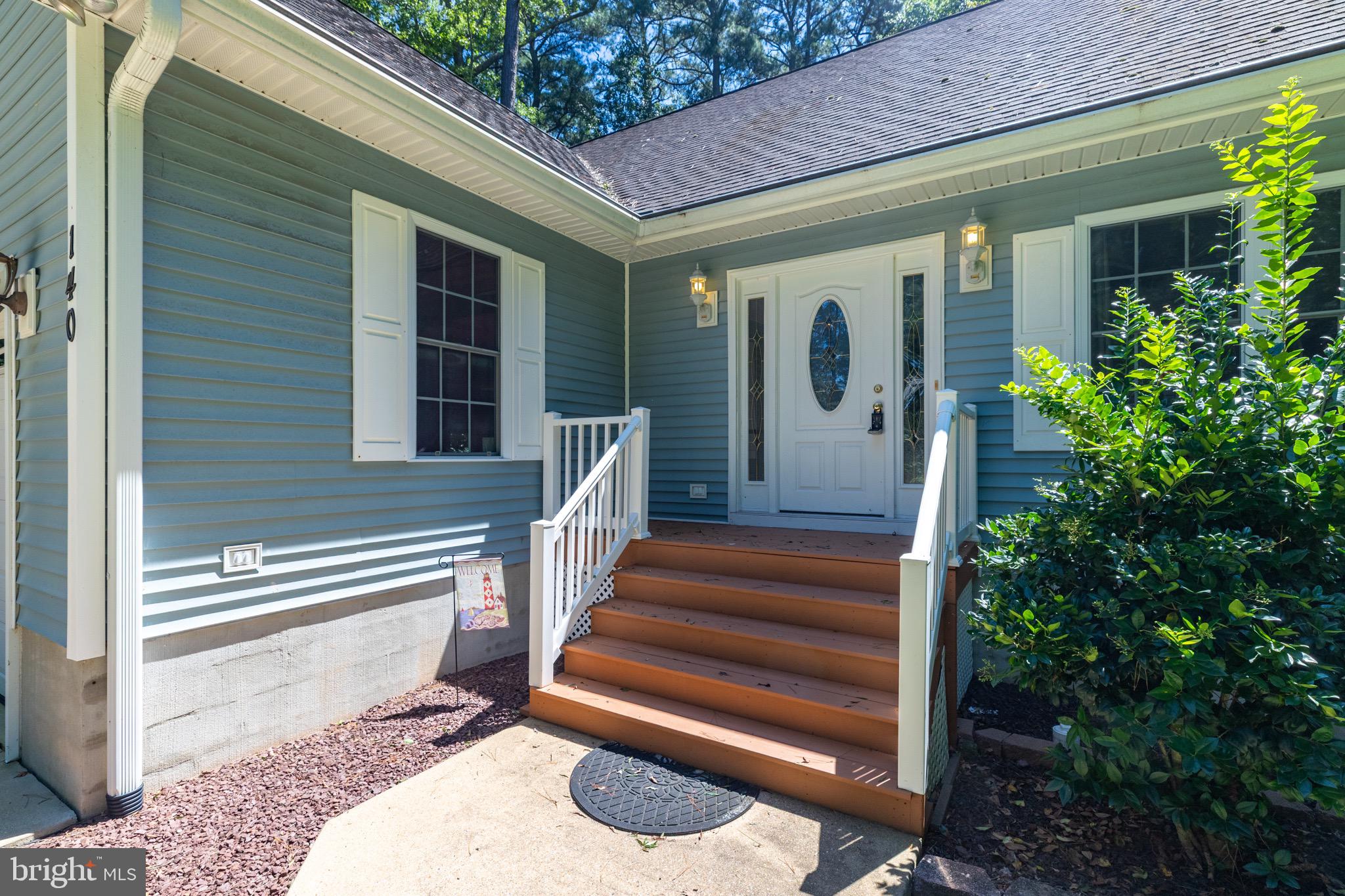 140 Pinehurst Road Ocean Pines, MD 21811 - Photo 3 of 32 a front view of a house with stairs