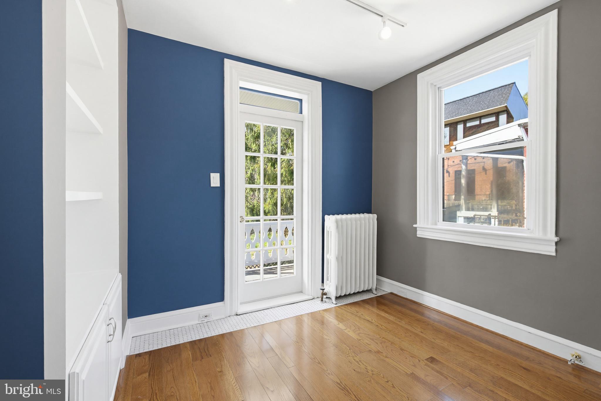 114 North Charlotte Street Lancaster, PA 17603 - Photo 25 of 40 an empty room with wooden floor and windows