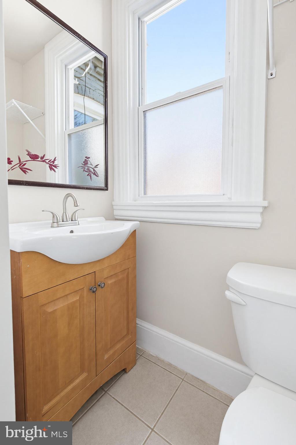 114 North Charlotte Street Lancaster, PA 17603 - Photo 28 of 40 a bathroom with a sink and a toilet