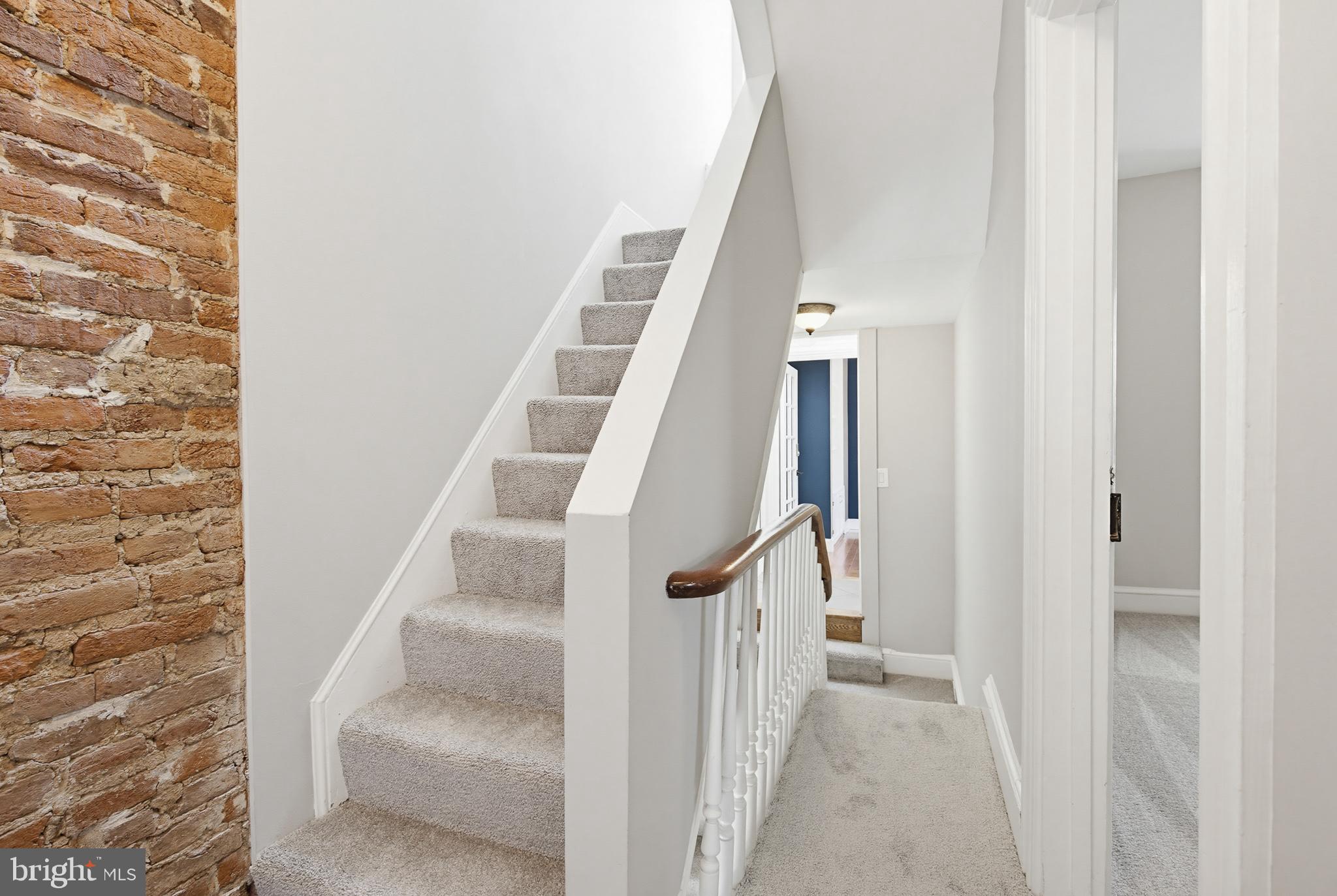 114 North Charlotte Street Lancaster, PA 17603 - Photo 29 of 40 a view of entryway and hall with wooden floor