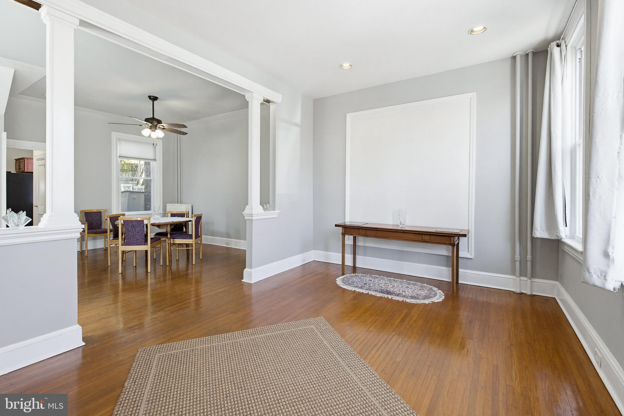 114 North Charlotte Street Lancaster, PA 17603 - Photo 5 of 40 a living room with furniture and a table