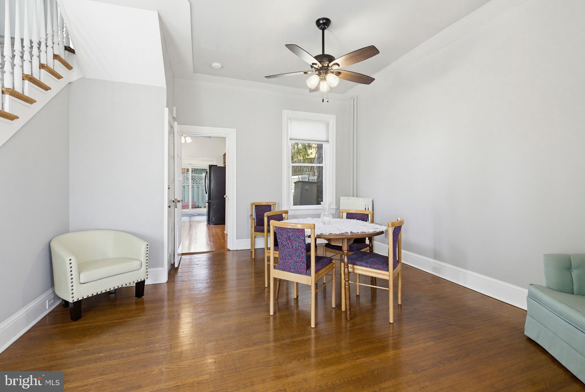 114 North Charlotte Street Lancaster, PA 17603 - Photo 8 of 40 a dining room with a wooden table and chairs