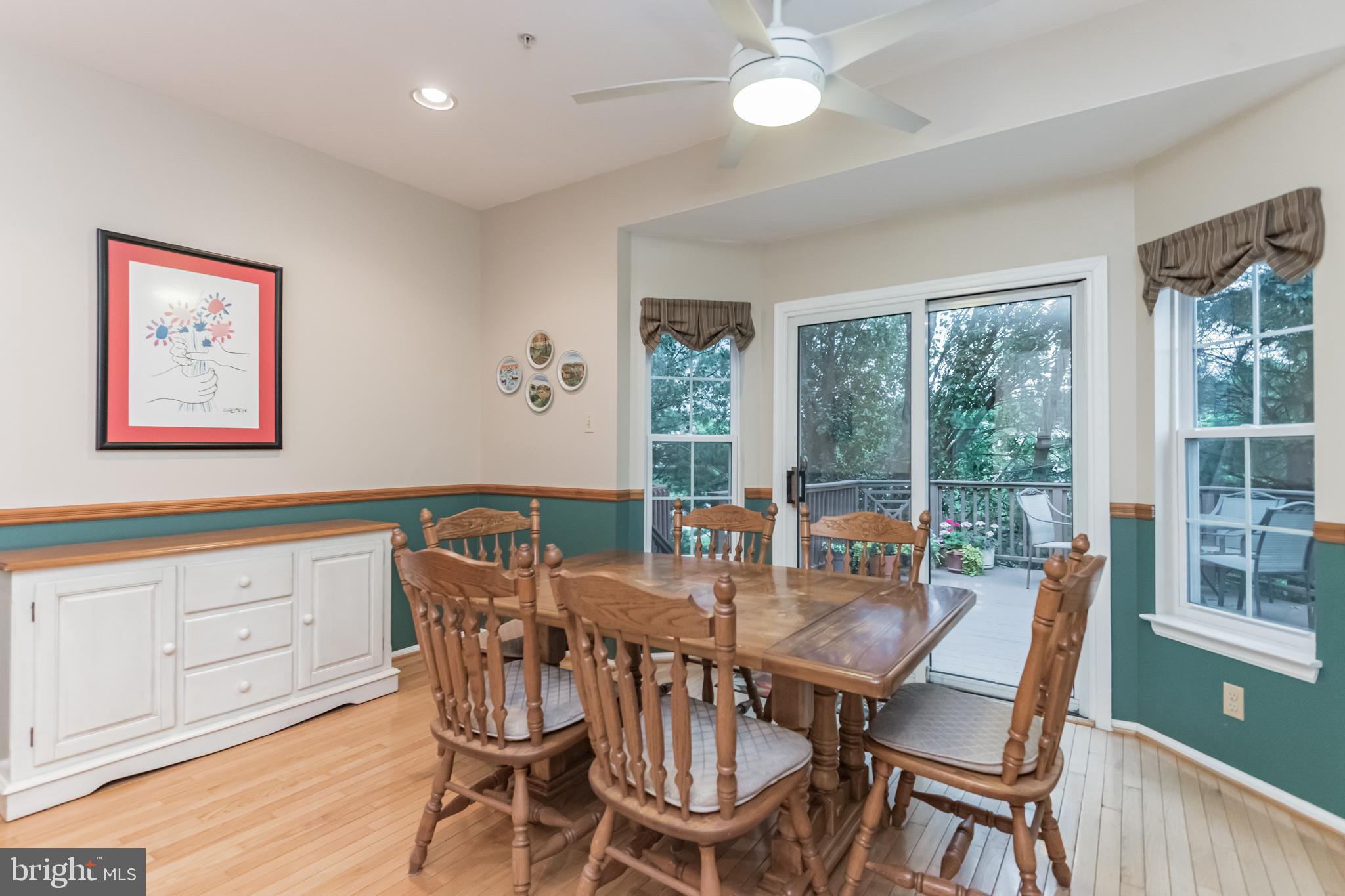 6305 Wind Rider Way Columbia, MD 21045 - Photo 11 of 38 Kitchen leads to Sliding Glass Doors Outside