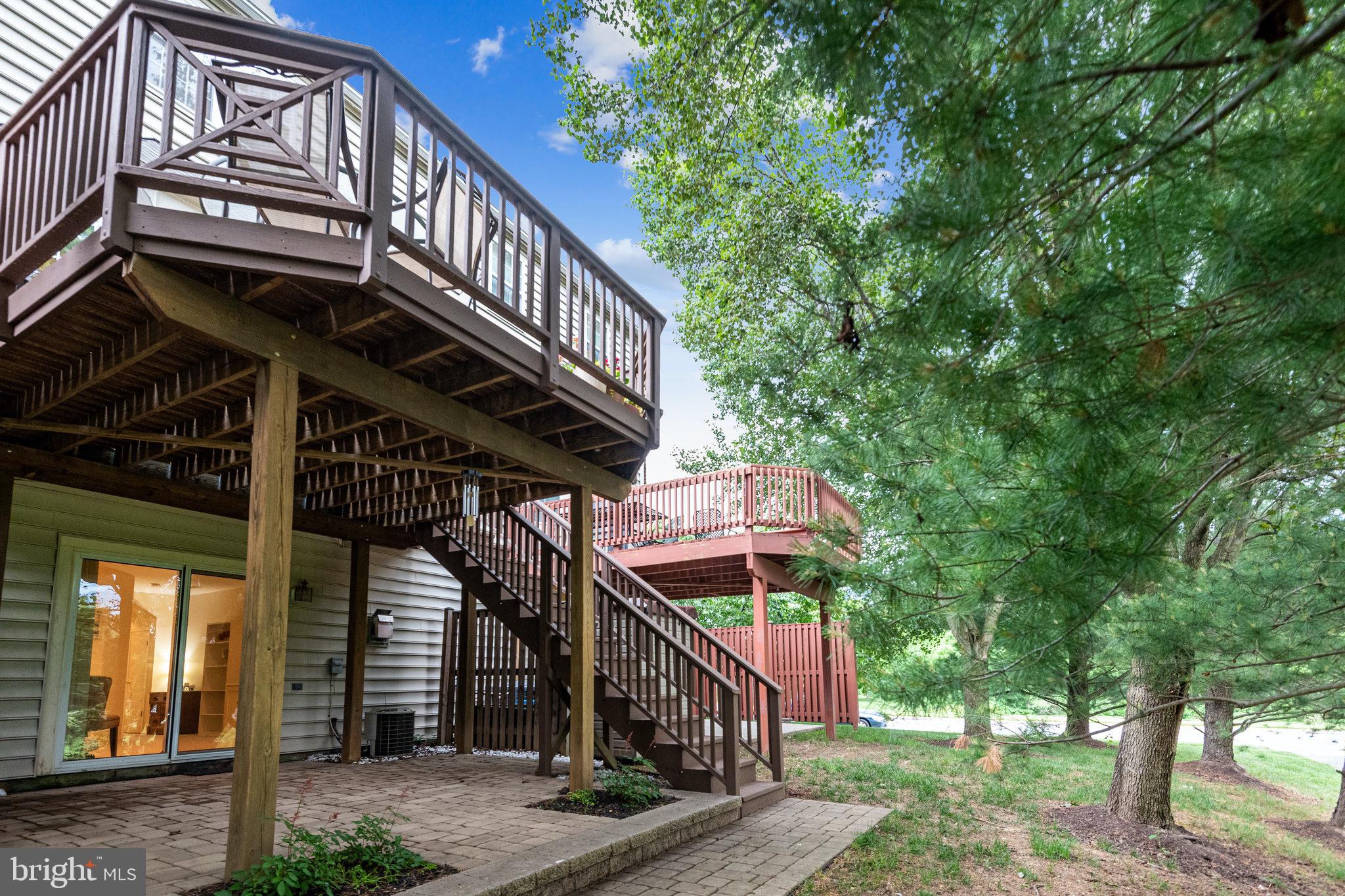6305 Wind Rider Way Columbia, MD 21045 - Photo 33 of 38 Back of home w/Patio & Deck Backing to Trees!