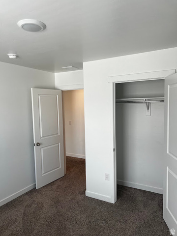 562 Hal Street, Unit 152 Tooele, UT 84074 - Photo 15 of 44 Neutral white walls with matching baseboards and door trim