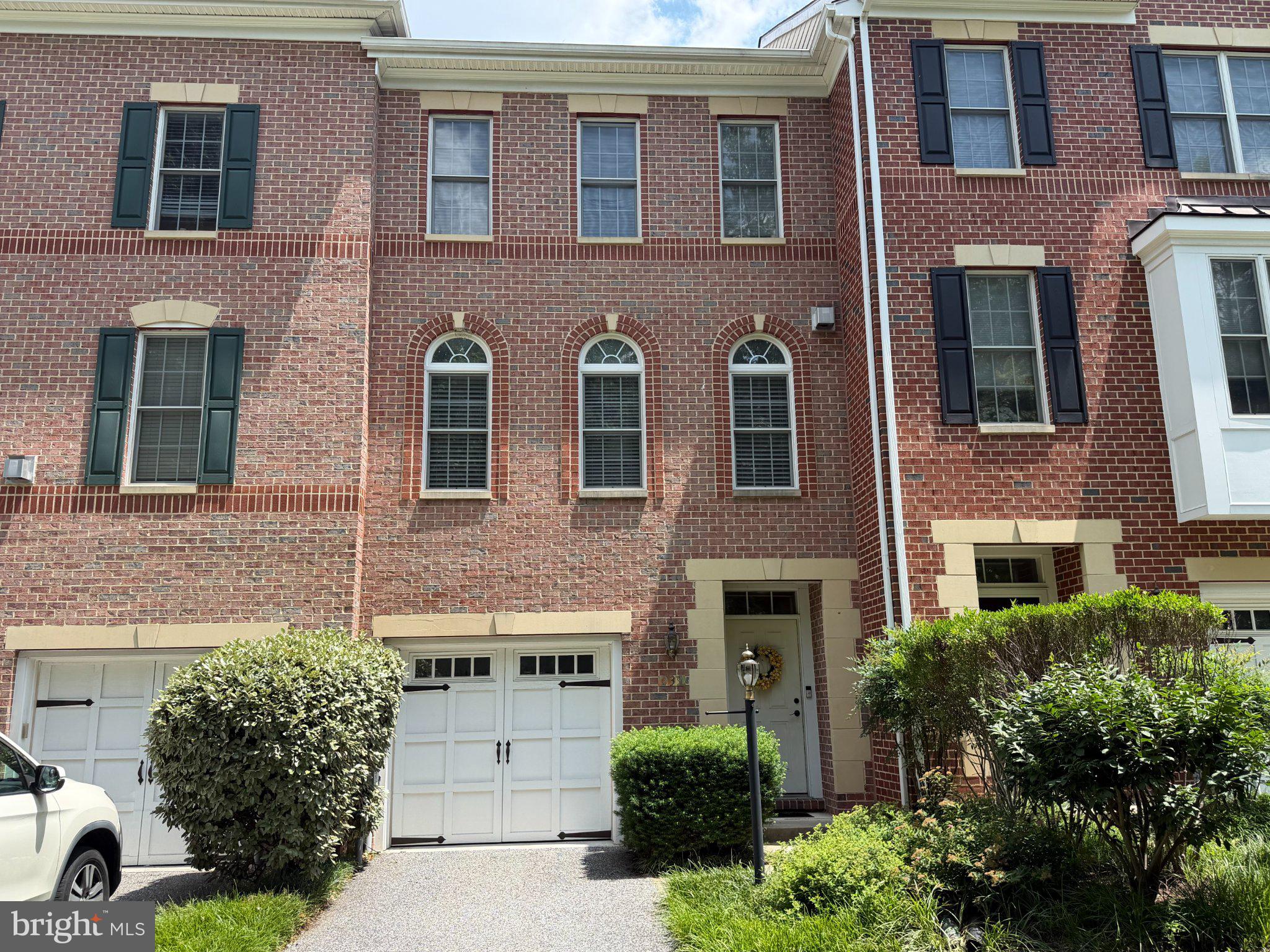 239 Anvil Way Baltimore, MD 21212 - Photo 1 of 1 Charming brick townhouse with greenery.