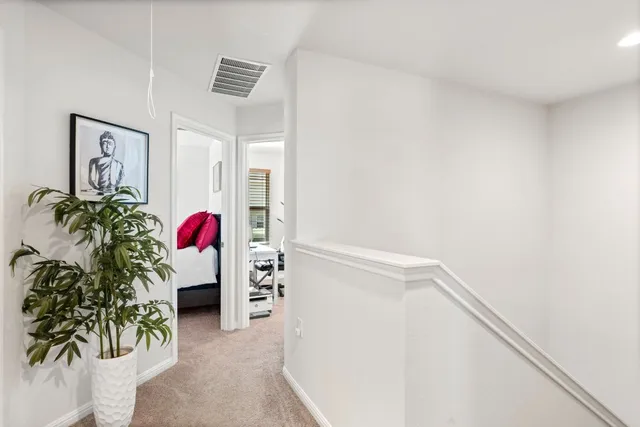 a bathroom with a sink a mirror and a window