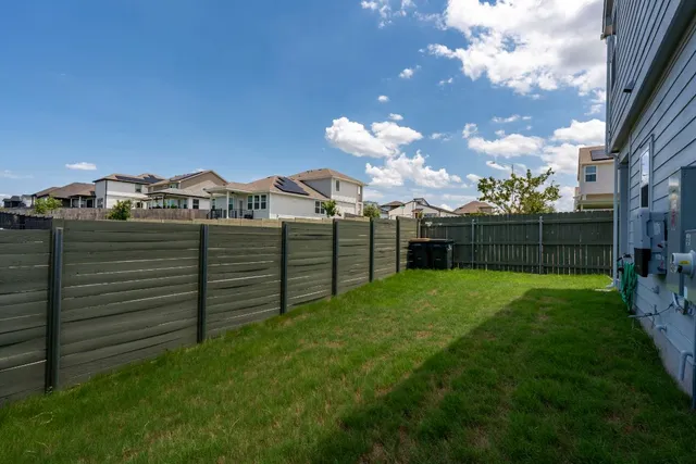 a view of a garden with a houses