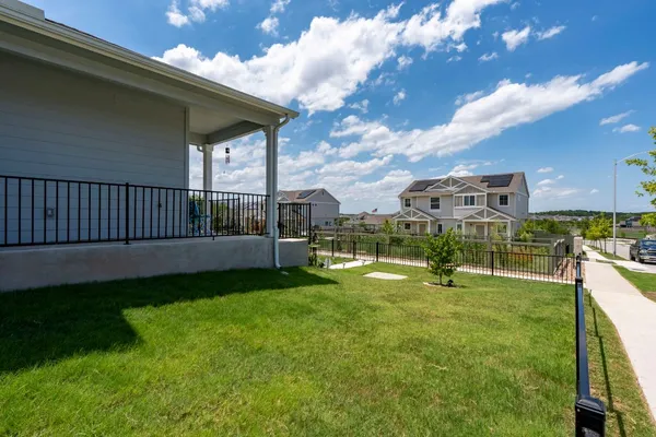 a view of swimming pool from a big yard