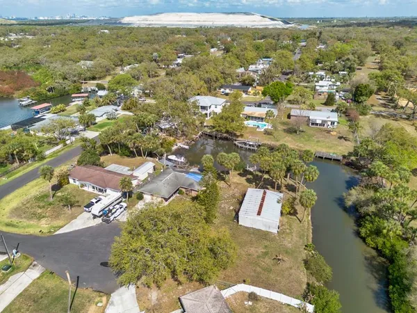 an aerial view of a houses with outdoor space