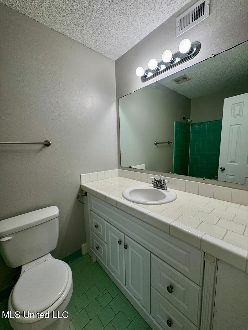 431 Bechtel Boulevard, Unit 3 Ocean Springs, MS 39564 - Photo 17 of 23 Bathroom in master bedroom