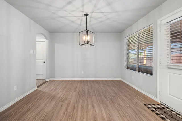 a view of a kitchen with a sink and a stove