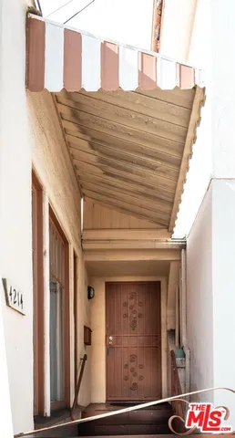 a view of a street with an outdoor space