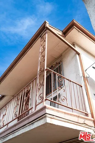 a view of a house with a street