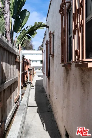 a view of a hallway with seating area