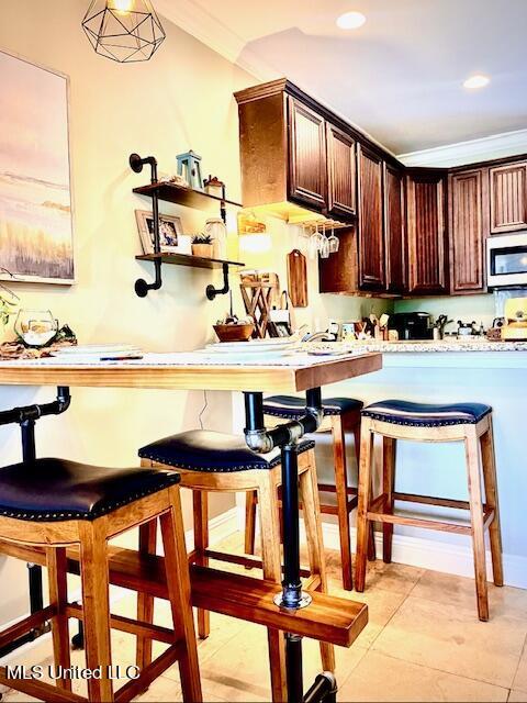 922 Porter Avenue, Unit 221 Ocean Springs, MS 39564 - Photo 7 of 29 DINING AND BREAKFAST AREA