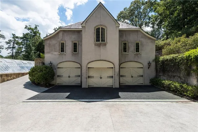 a backyard of a house with lots of green space