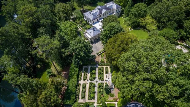 an aerial view of house with yard