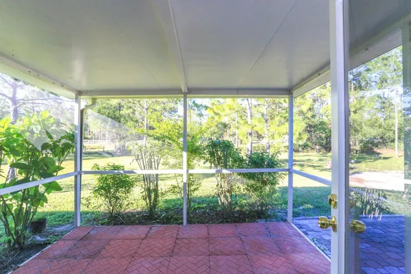 a view of a room with a large window