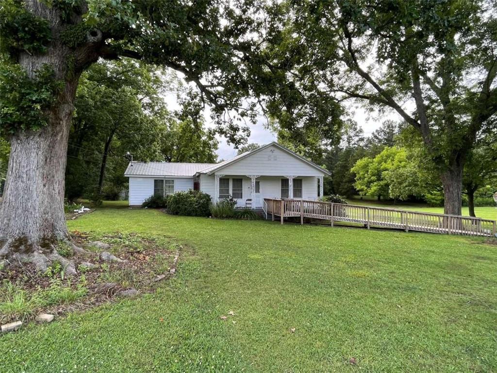 121 Yale Road Northeast Rome, GA 30161 - Photo 1 of 1 a front view of a house with garden