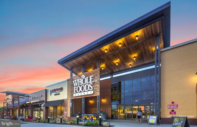 a balcony with tall trees