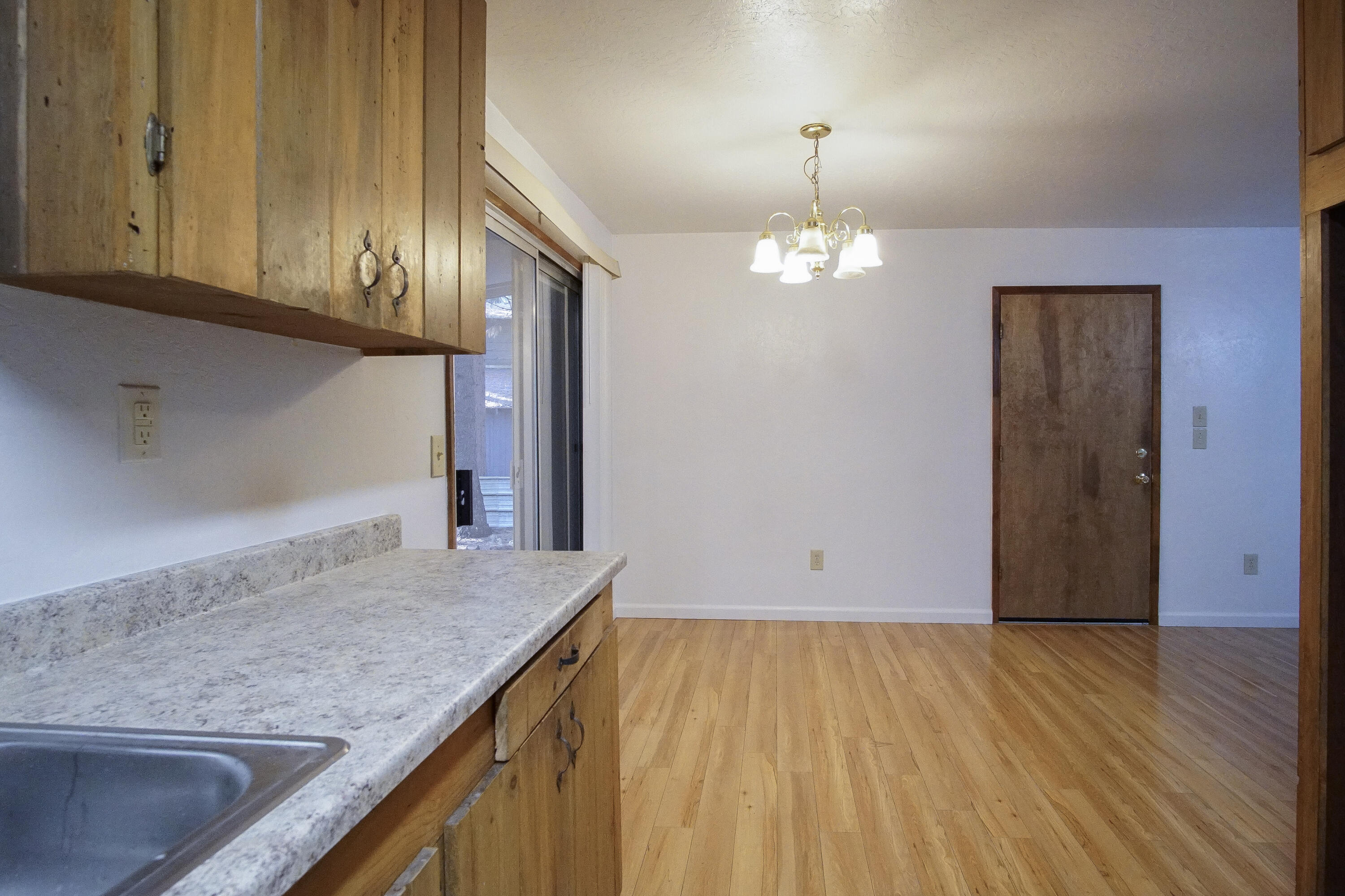 8298 Starlite Pines Road Shingletown, CA 96088 - Photo 8 of 21 Kitchen Dining View Garage Entrance