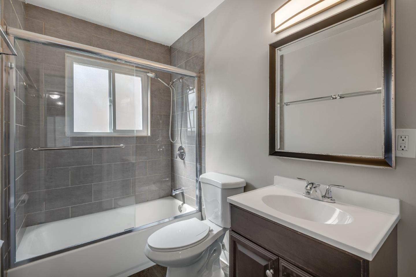 1626 Dwight Way Berkeley, CA 94703 - Photo 9 of 9 a bathroom with a sink toilet and shower