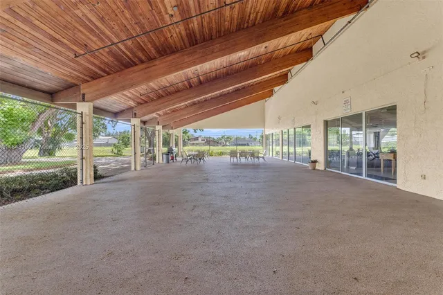 a view of a room with wooden walls