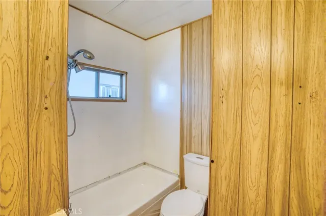 a bathroom with a shower curtain