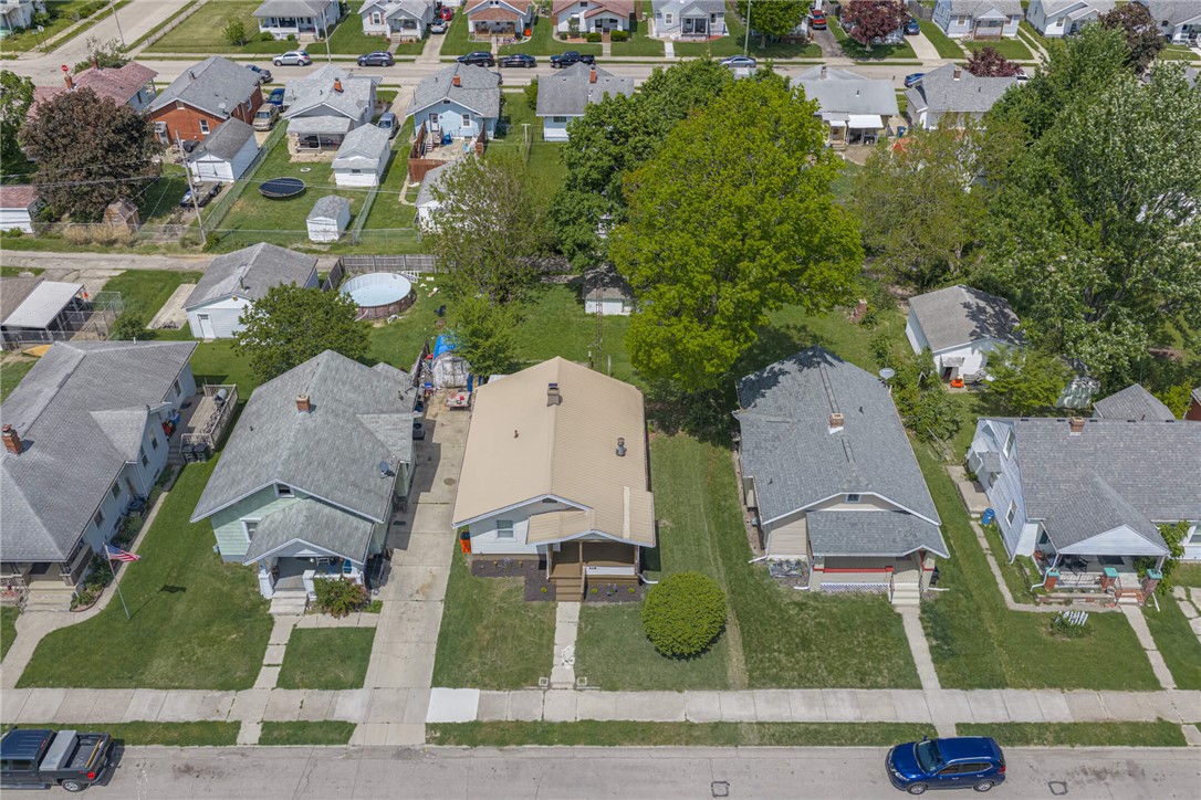 2118 Hillside Avenue Springfield, OH 45503 - Photo 2 of 28 An aerial view captures the neighborhood with well-maintained homes and lush greenery.